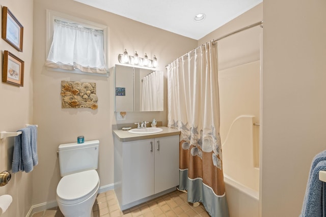 full bathroom with vanity, toilet, and shower / bath combo with shower curtain