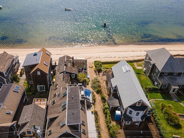 aerial view featuring a water view and a beach view