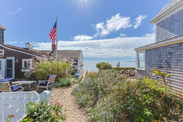 view of yard featuring a water view