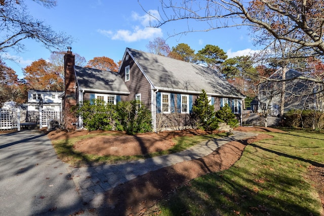 exterior space featuring a front lawn