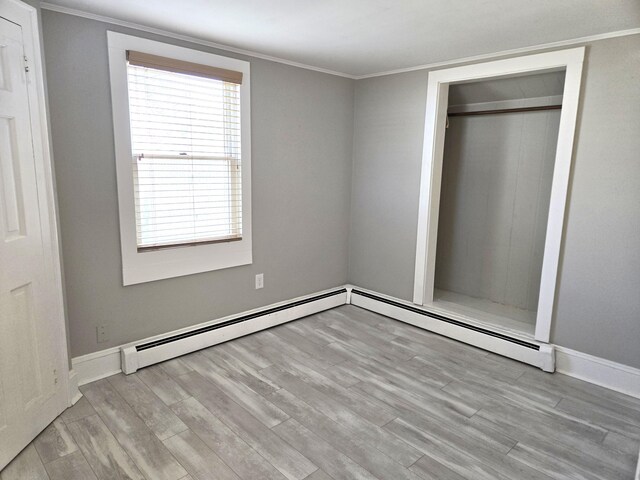 39 Alden Way, Hyannis, MA 02601 - unfurnished bedroom featuring wood finished floors, ornamental molding, and baseboards
