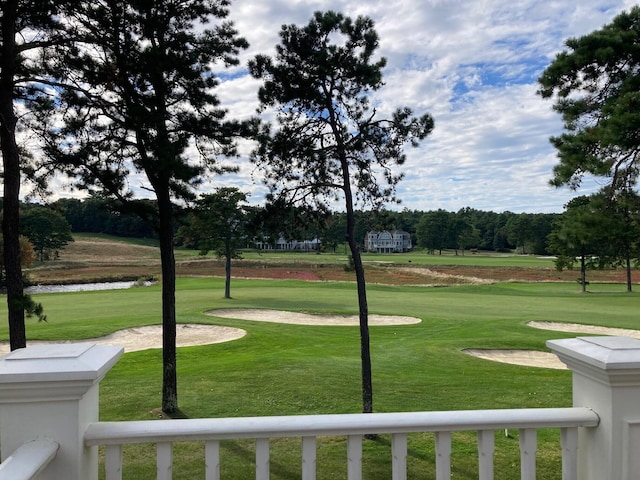 view of community featuring a lawn