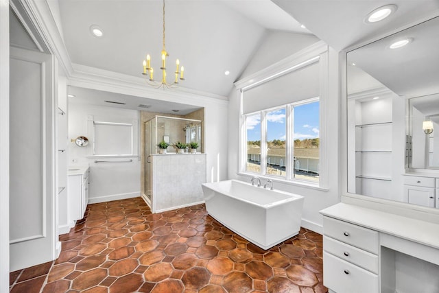 bathroom featuring a chandelier, lofted ceiling, independent shower and bath, and vanity