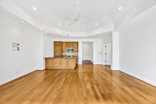 unfurnished living room with crown molding, light hardwood / wood-style flooring, ceiling fan, a tray ceiling, and wooden ceiling