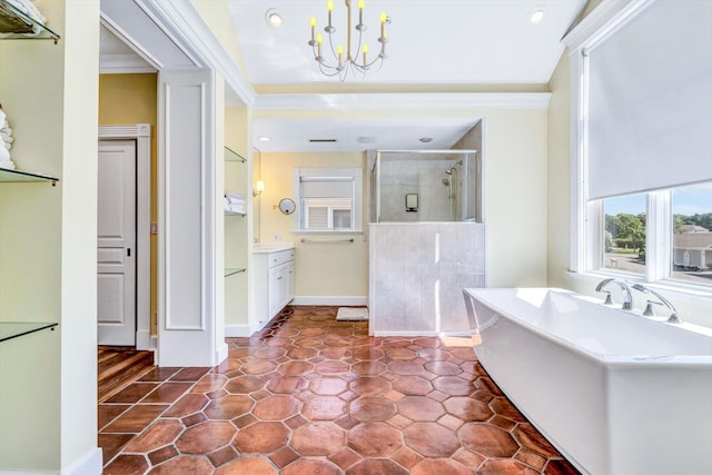 bathroom with vanity, ornamental molding, independent shower and bath, and an inviting chandelier