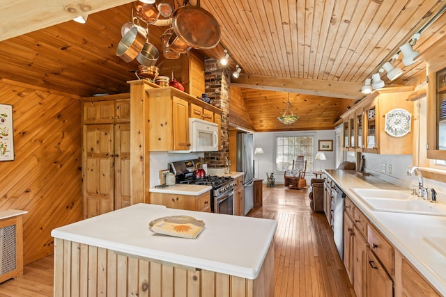 248 N Falmouth Hwy, North Falmouth, MA 02556 - kitchen featuring stainless steel appliances, a sink, vaulted ceiling with beams, wood ceiling, and wood-type flooring