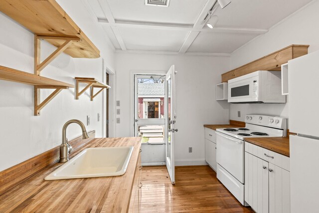 248 N Falmouth Hwy, North Falmouth, MA 02556 - kitchen featuring a sink, hardwood / wood-style floors, wood counters, white appliances, and white cabinets