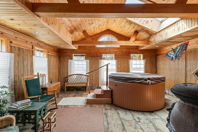 248 N Falmouth Hwy, North Falmouth, MA 02556 - living area with wooden walls, wooden ceiling, lofted ceiling with skylight, and light wood finished floors
