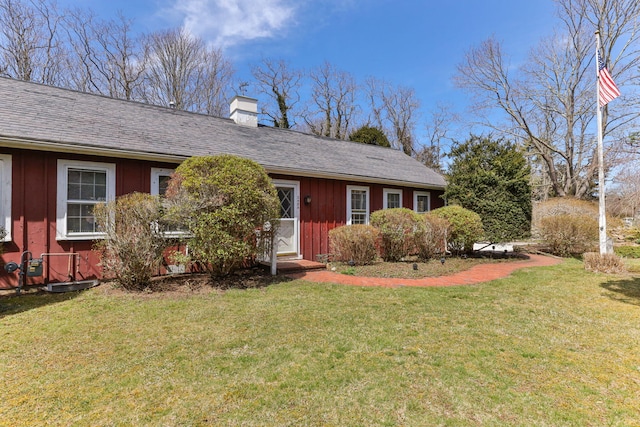 248 N Falmouth Hwy, North Falmouth, MA 02556 - ranch-style home with a chimney, board and batten siding, and a front yard
