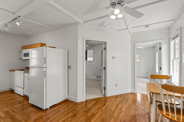 248 N Falmouth Hwy, North Falmouth, MA 02556 - kitchen with light wood finished floors, baseboards, ceiling fan, and white appliances