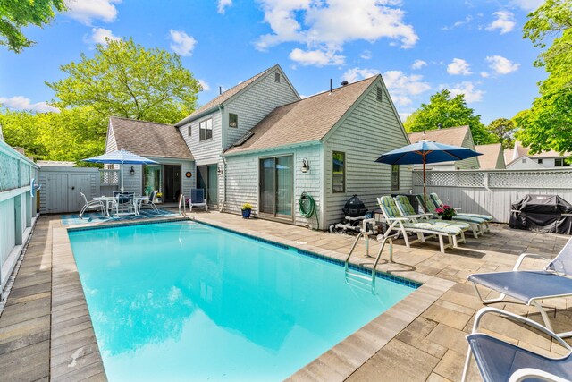 100 Mid-Iron Way Unit 7021, Mashpee, MA 02649 - view of pool with central AC, fence, a grill, a fenced in pool, and a patio area
