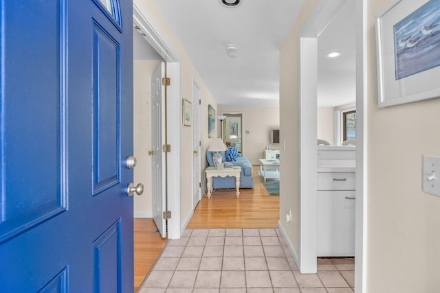 entrance foyer with light wood-style floors