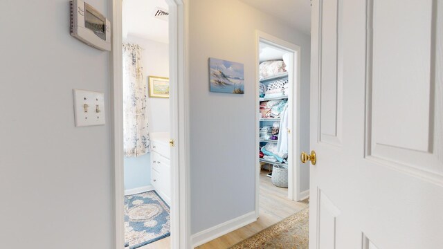 hallway featuring light hardwood / wood-style floors