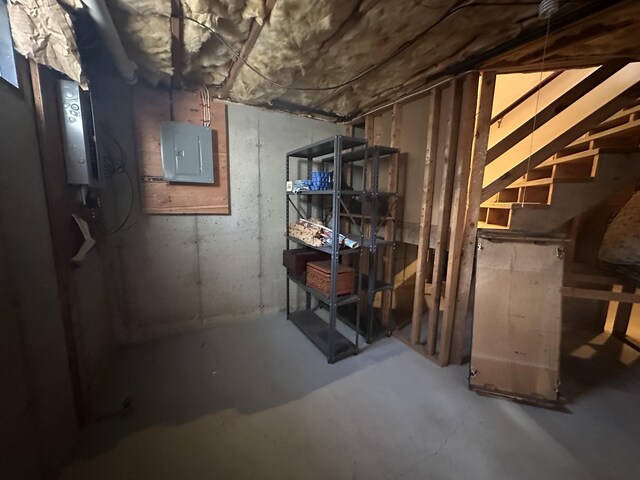 basement featuring electric panel