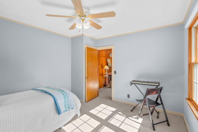 11 Joe Lincoln Rd, West Harwich, MA 02671 - bedroom with baseboards, light colored carpet, ornamental molding, and a ceiling fan