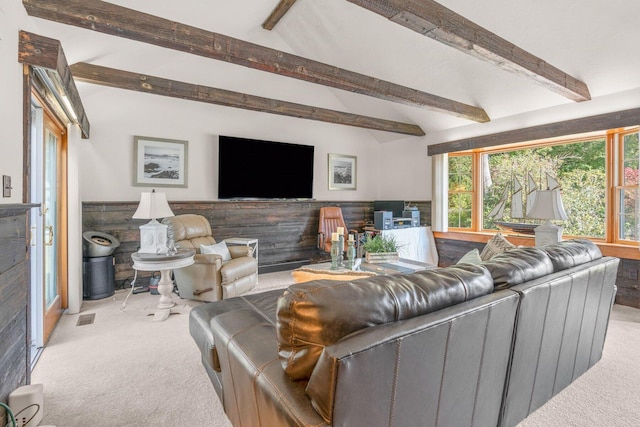 11 Joe Lincoln Rd, West Harwich, MA 02671 - living room featuring lofted ceiling with beams, carpet, a wainscoted wall, and visible vents