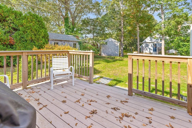 11 Joe Lincoln Rd, West Harwich, MA 02671 - wooden terrace featuring a yard, a storage unit, and an outdoor structure