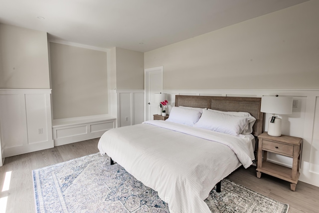 bedroom with light hardwood / wood-style floors