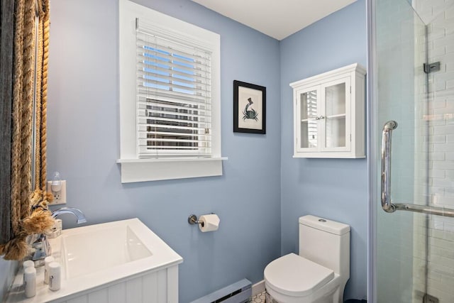 full bathroom featuring a sink, toilet, and a shower stall