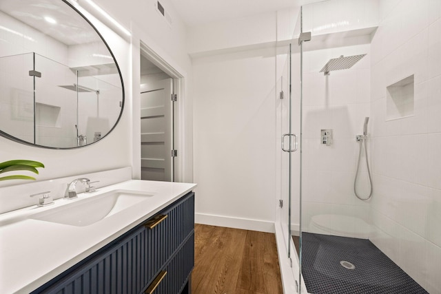 50 Nelson Ave Unit 4, Provincetown, MA 02657 - full bath with a shower stall, wood finished floors, and vanity