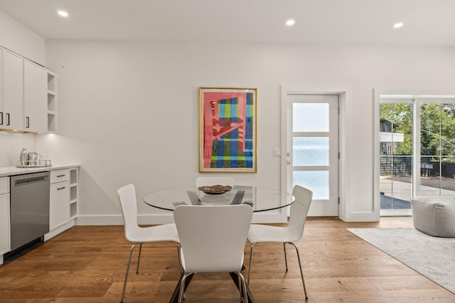 50 Nelson Ave Unit 4, Provincetown, MA 02657 - dining space featuring recessed lighting, wood finished floors, and bar