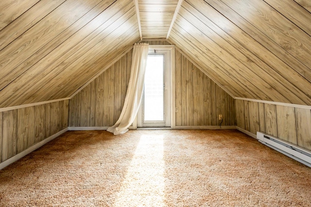 additional living space featuring a baseboard heating unit, wood ceiling, wooden walls, and vaulted ceiling