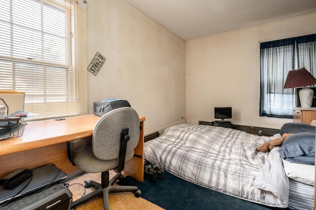 bedroom featuring carpet