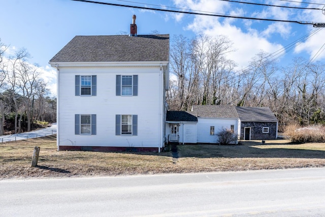 view of front of house with a front yard