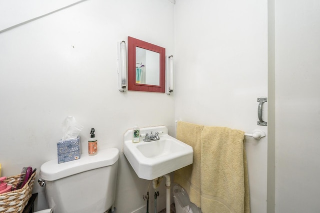 bathroom with sink and toilet