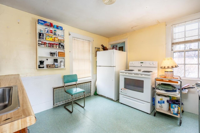 kitchen featuring white appliances