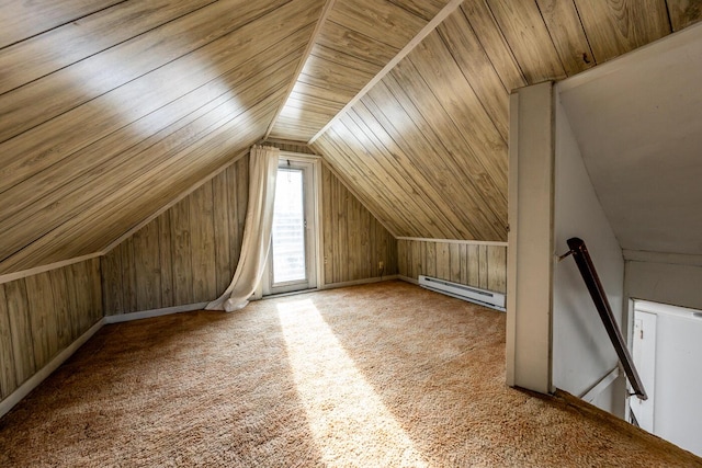 additional living space featuring wood walls, lofted ceiling, carpet flooring, a baseboard heating unit, and wooden ceiling