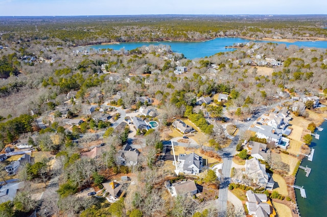 aerial view with a residential view and a water view