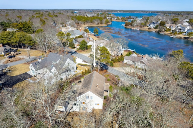 bird's eye view featuring a residential view and a water view