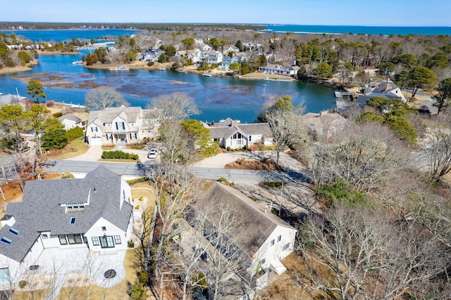 birds eye view of property with a residential view and a water view