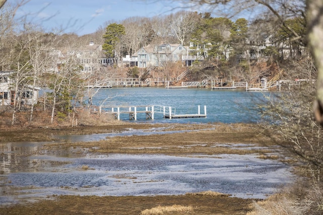 view of dock with a water view