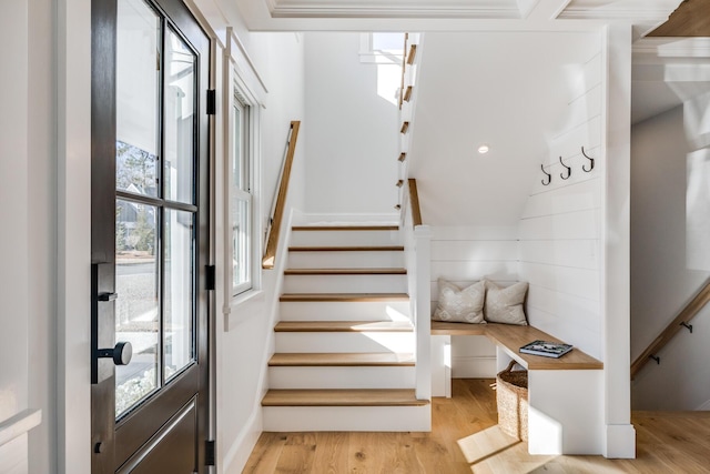 staircase with wood finished floors