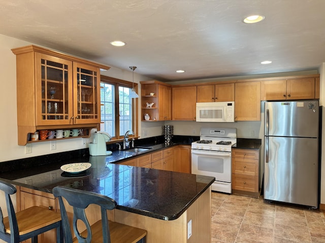 kitchen featuring open shelves, a peninsula, white appliances, glass insert cabinets, and a sink