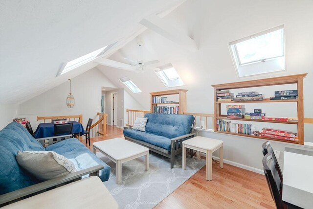37 Old Salem Way, Osterville, MA 02655 - living area featuring a skylight, wood finished floors, and a ceiling fan