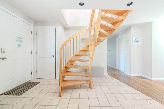 37 Old Salem Way, Osterville, MA 02655 - foyer with stairway, baseboards, and light tile patterned floors