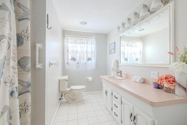 37 Old Salem Way, Osterville, MA 02655 - full bathroom featuring toilet, tile patterned floors, vanity, and baseboards