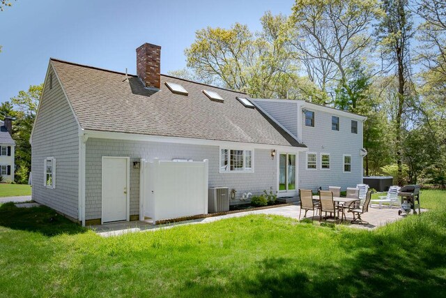 37 Old Salem Way, Osterville, MA 02655 - back of property with roof with shingles, central AC unit, a chimney, a patio, and a lawn