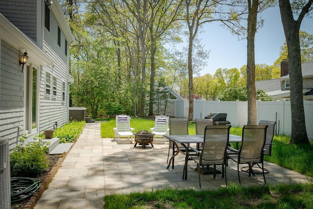 37 Old Salem Way, Osterville, MA 02655 - view of patio / terrace featuring an outdoor fire pit, a fenced backyard, and outdoor dining area