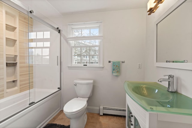 full bathroom with baseboards, toilet, combined bath / shower with glass door, vanity, and a baseboard heating unit