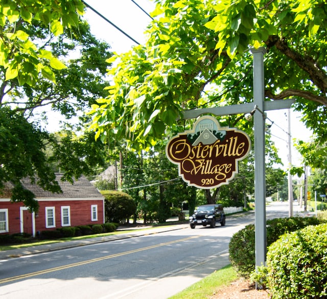 view of road with curbs and sidewalks