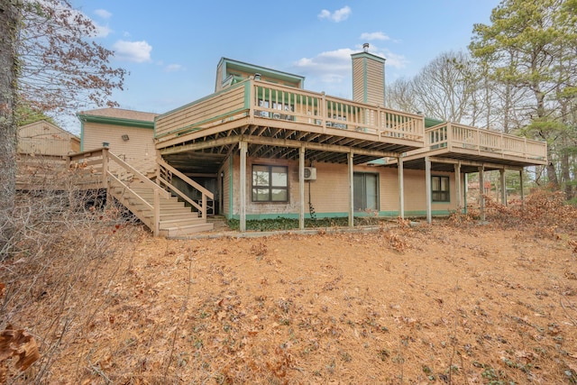 rear view of house with a deck