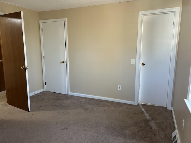 18 Russo Rd, West Yarmouth, MA 02673 - unfurnished bedroom with baseboards and carpet