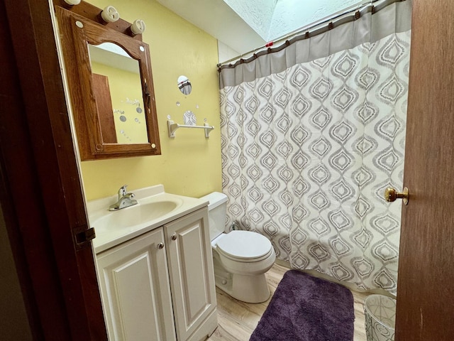 56 Wendward Way W, Yarmouth, MA 02673 - bathroom featuring toilet, vanity, a shower with curtain, and a skylight