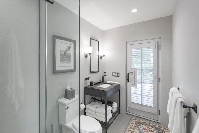 full bath with tile walls, toilet, vanity, tile patterned flooring, and recessed lighting