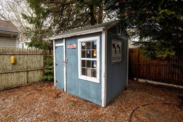 52 Nauset Rd, West Yarmouth, MA 02673 - view of shed with a fenced backyard