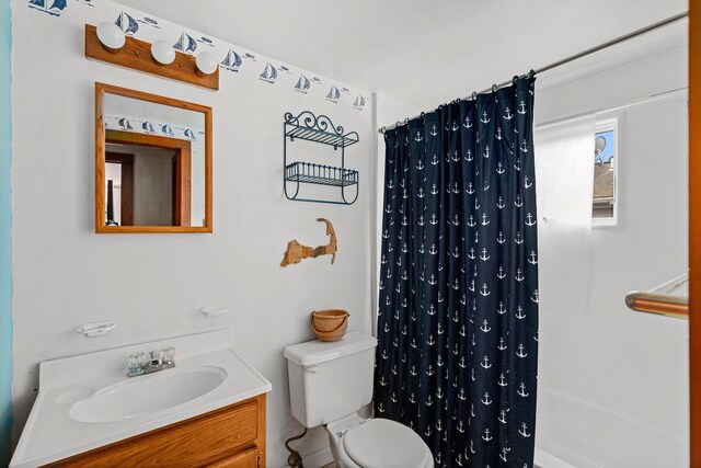52 Nauset Rd, West Yarmouth, MA 02673 - bathroom with toilet and vanity